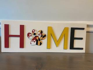 Maryland Home sign with flag paw print